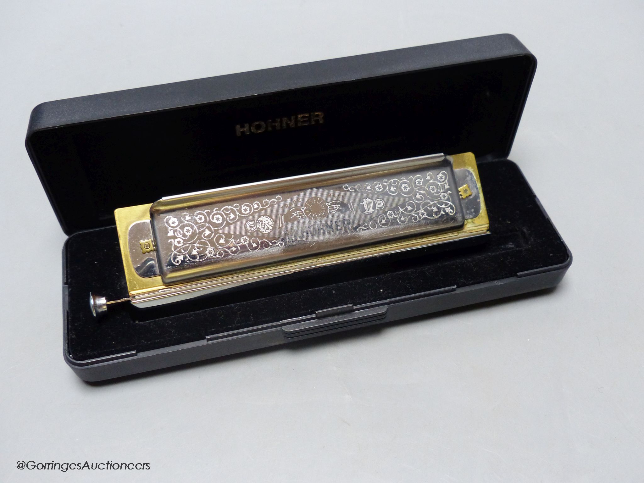 An M.Hohner Super Chromatica 270 deluxe Harmonica, cased